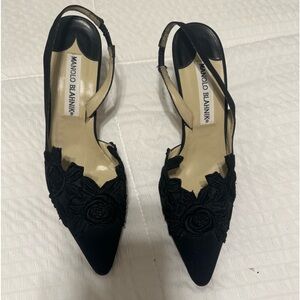 Black embroidered Manolo Blahnik heels. Vintage and in fantastic condition.